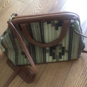 Cross body purse with handle straps